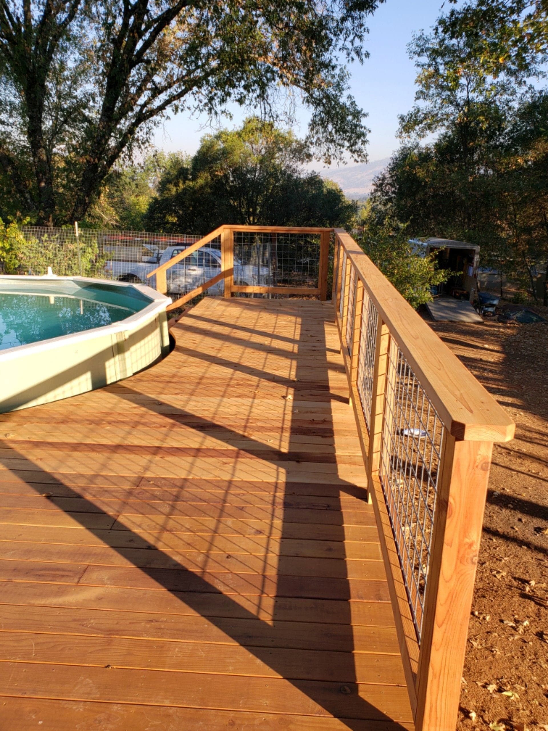 Close-up of custom gate joinery and redwood detail by RLS Custom Carpentry, Lucerne CA