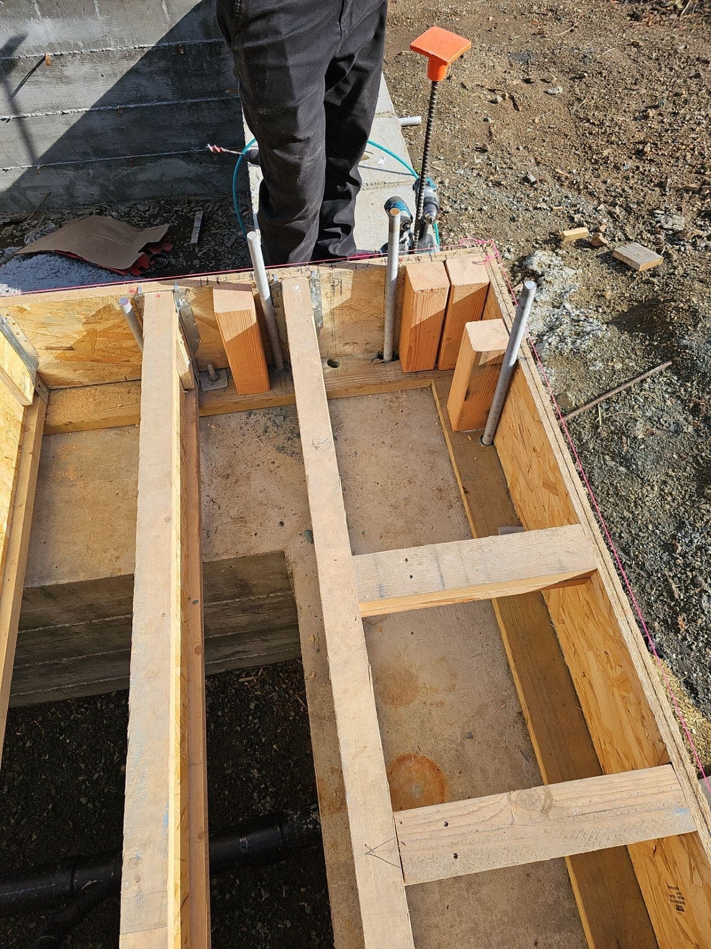 New floor framing and joists set on an anchor-bolted mudsill at 3600 White Sulphur Spring Rd, framed by RLS Custom Carpentry in Mendocino County, CA