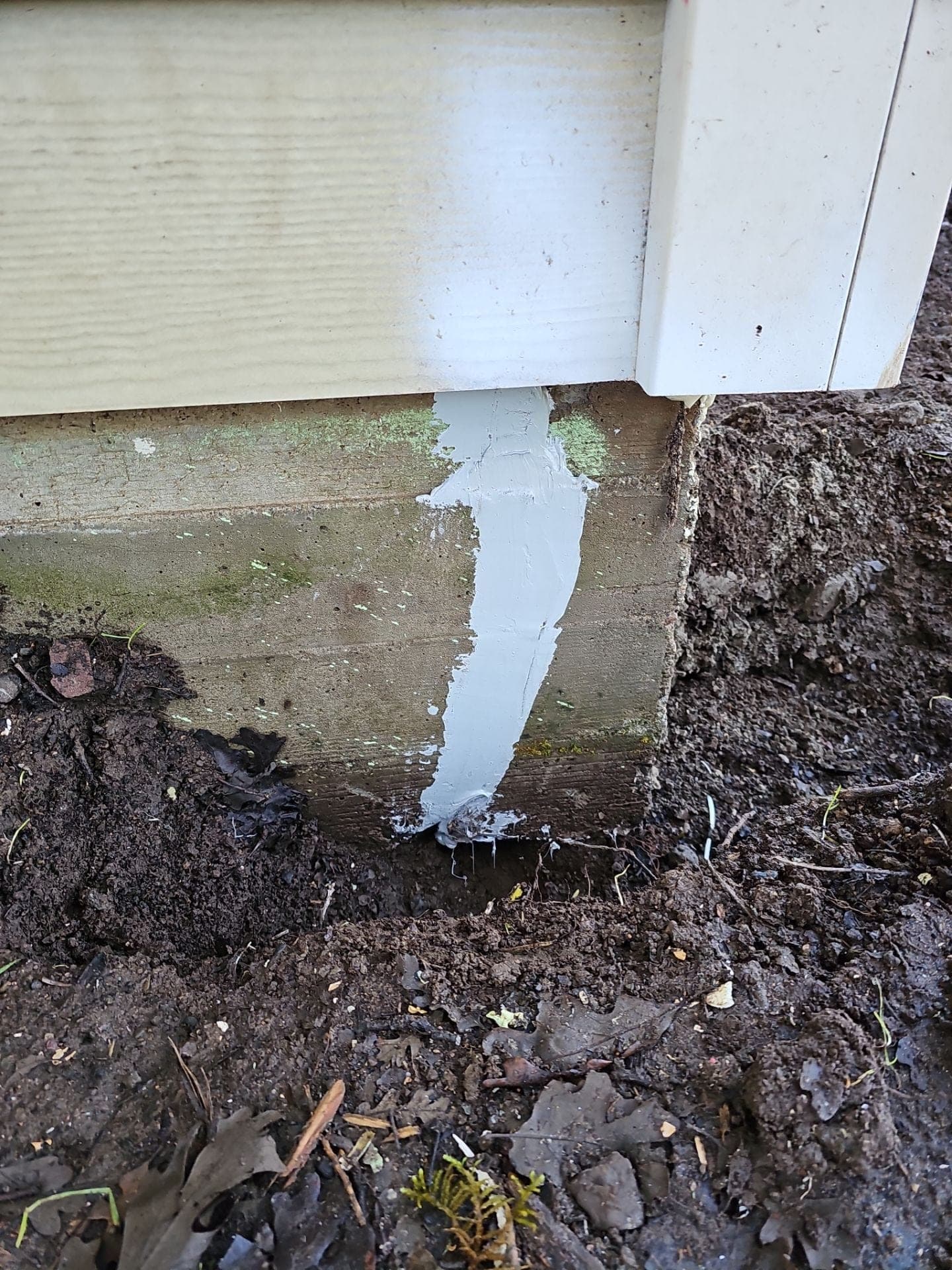 Foundation crack sealed and repaired with structural patch material after RLS Custom Carpentry foundation repair in Mendocino County, CA